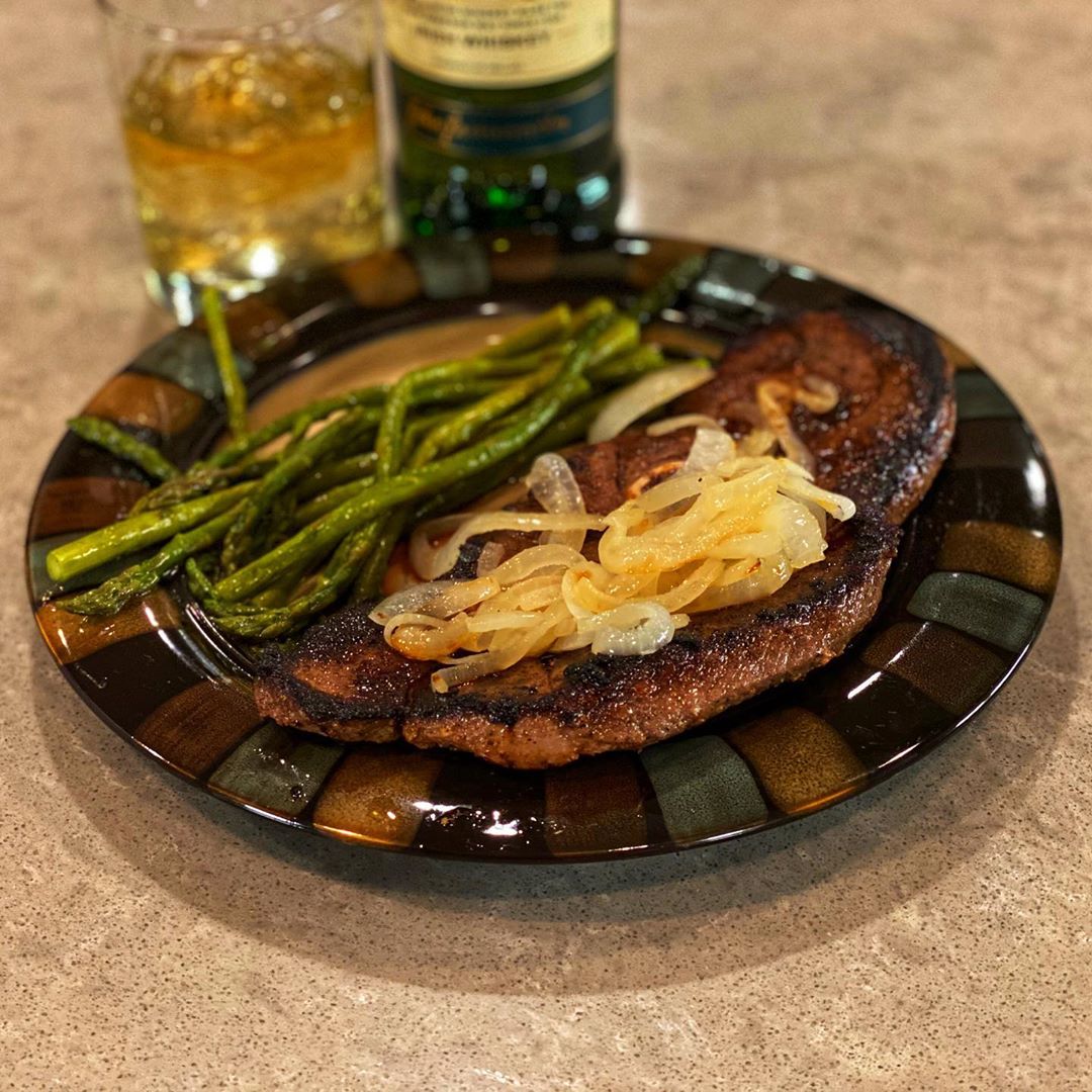 Venison round steak, onions, asparagus, and a glass of Jameson.